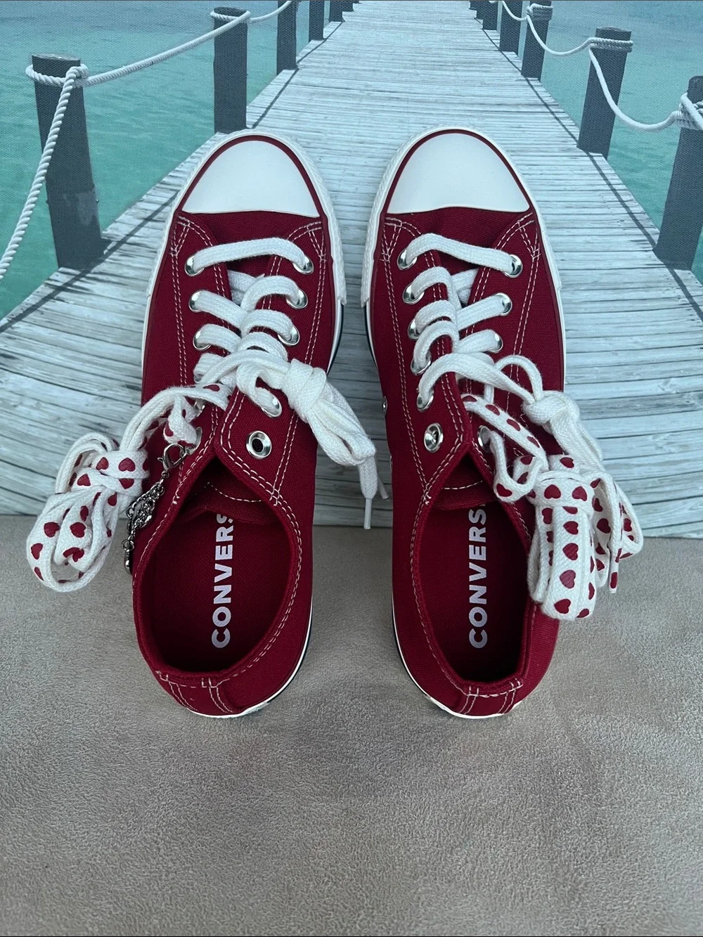 Converse Women's Low Top Sneakers in Burgundy with Heart-Print Laces